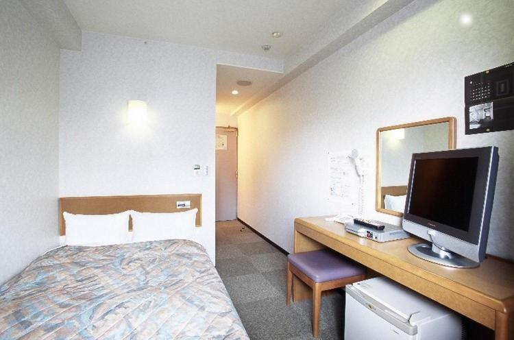 Hotel New Budget Muroran Habitación foto